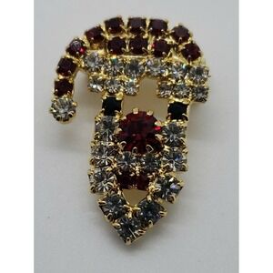 Vintage small holiday Christmas rhinestone Santa face brooch pin